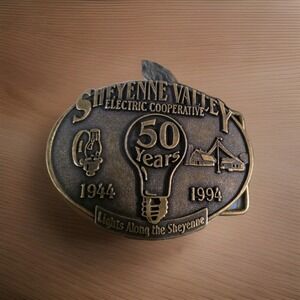 Vintage Cheyenne Valley Electric Cooperative 50th Anniversary Brass Belt Buckle